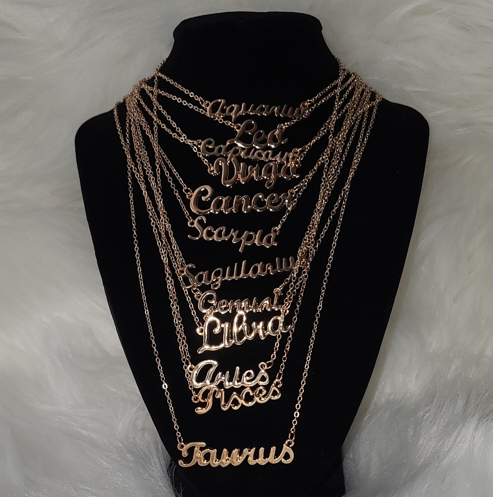 Gold plated horoscope scripted necklace